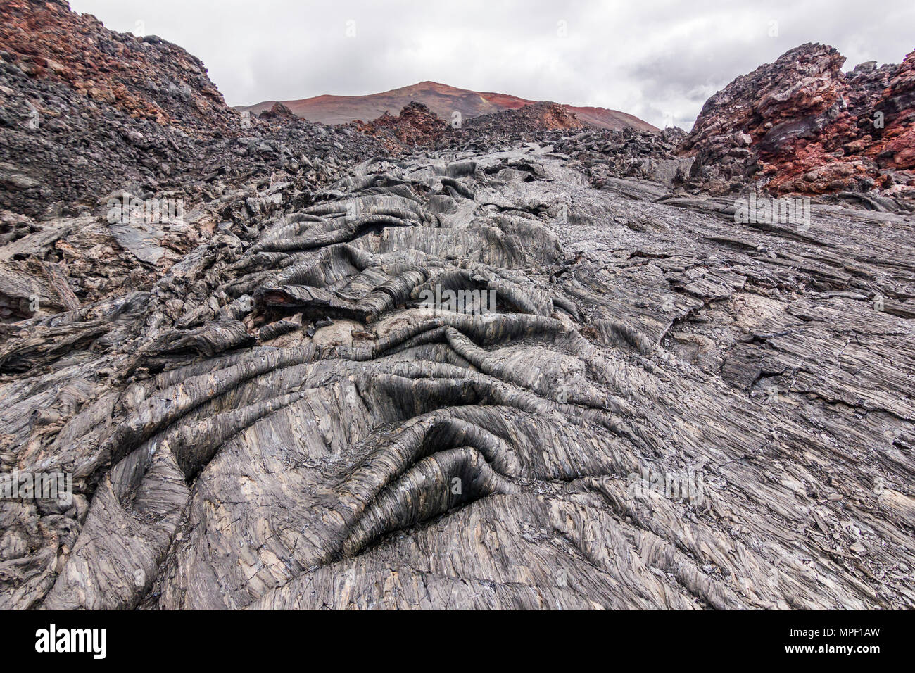 La formazione di tappeti di lava fredda del vulcano attivo Foto Stock
