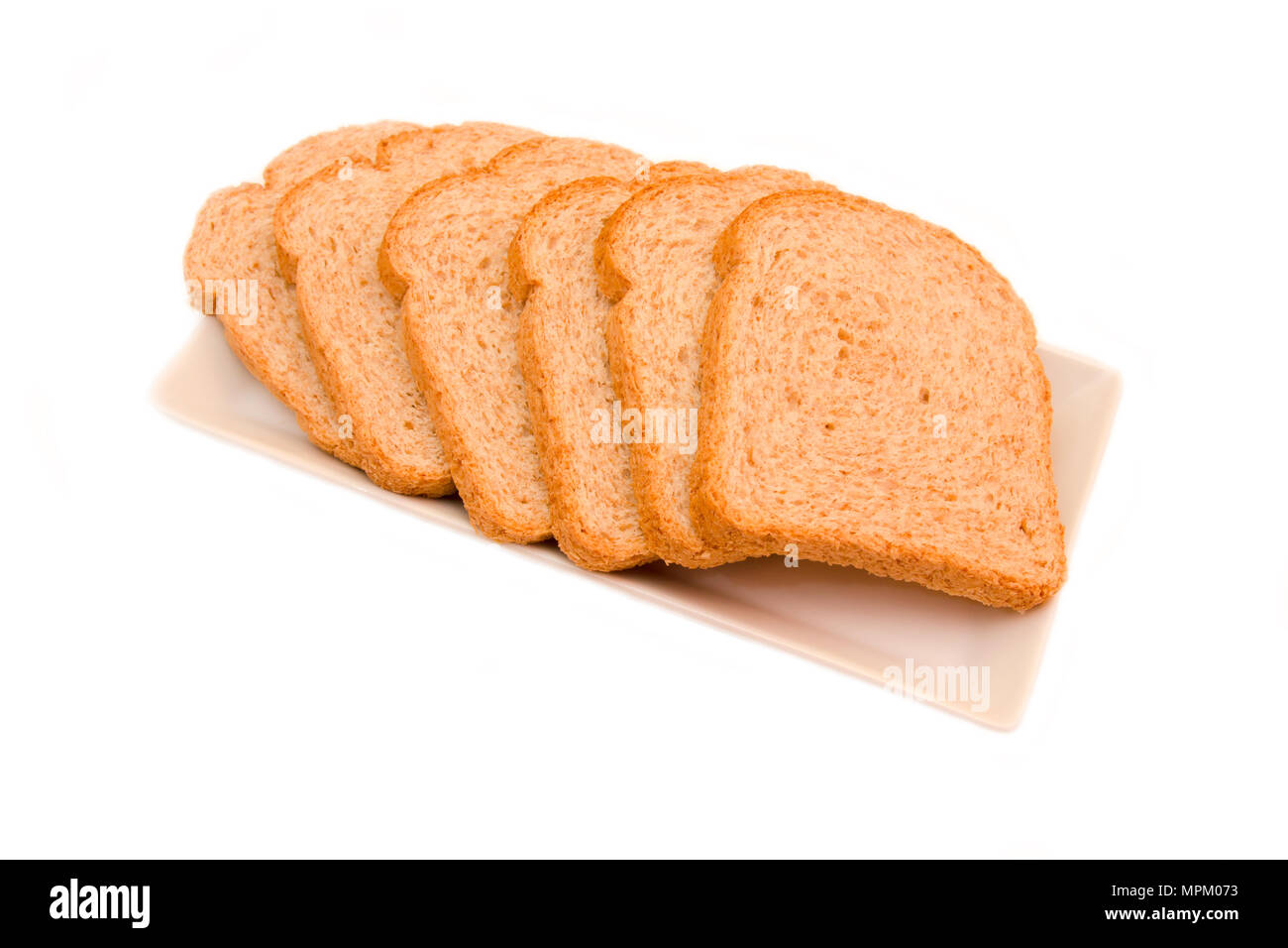 Fette di pane integrale su sfondo bianco Foto Stock