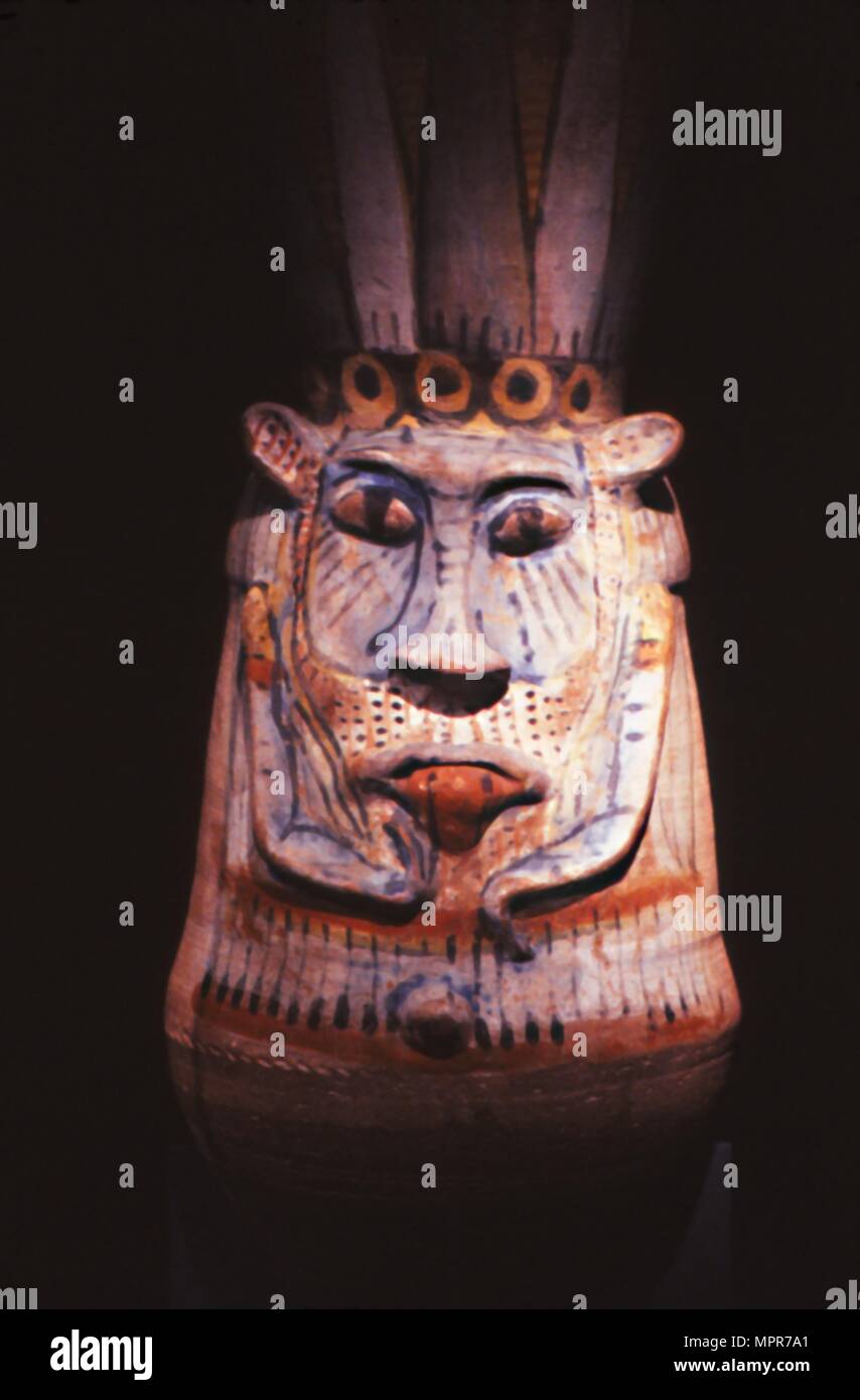 Dipinta la figura del dio egizio Bes. Artista: sconosciuto. Foto Stock