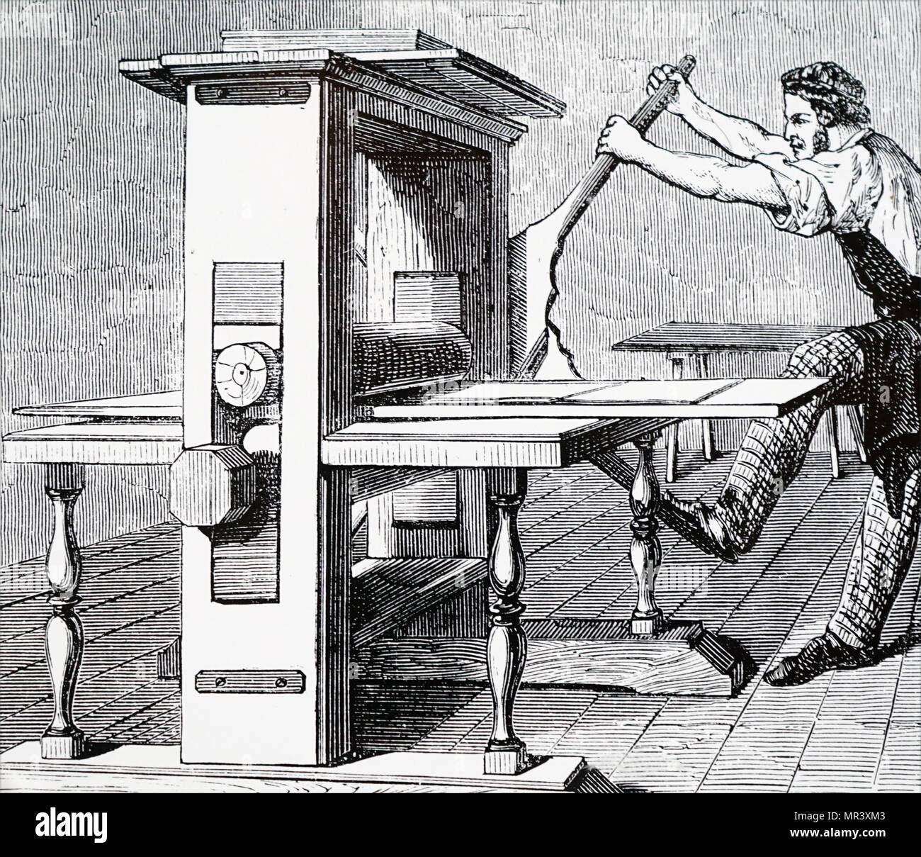 Incisione raffigurante una stampante di calcografia. Datata del XIX secolo Foto Stock