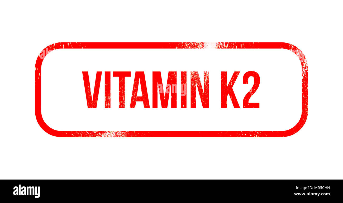La vitamina K2 - rosso gomma grunge, timbro Foto Stock
