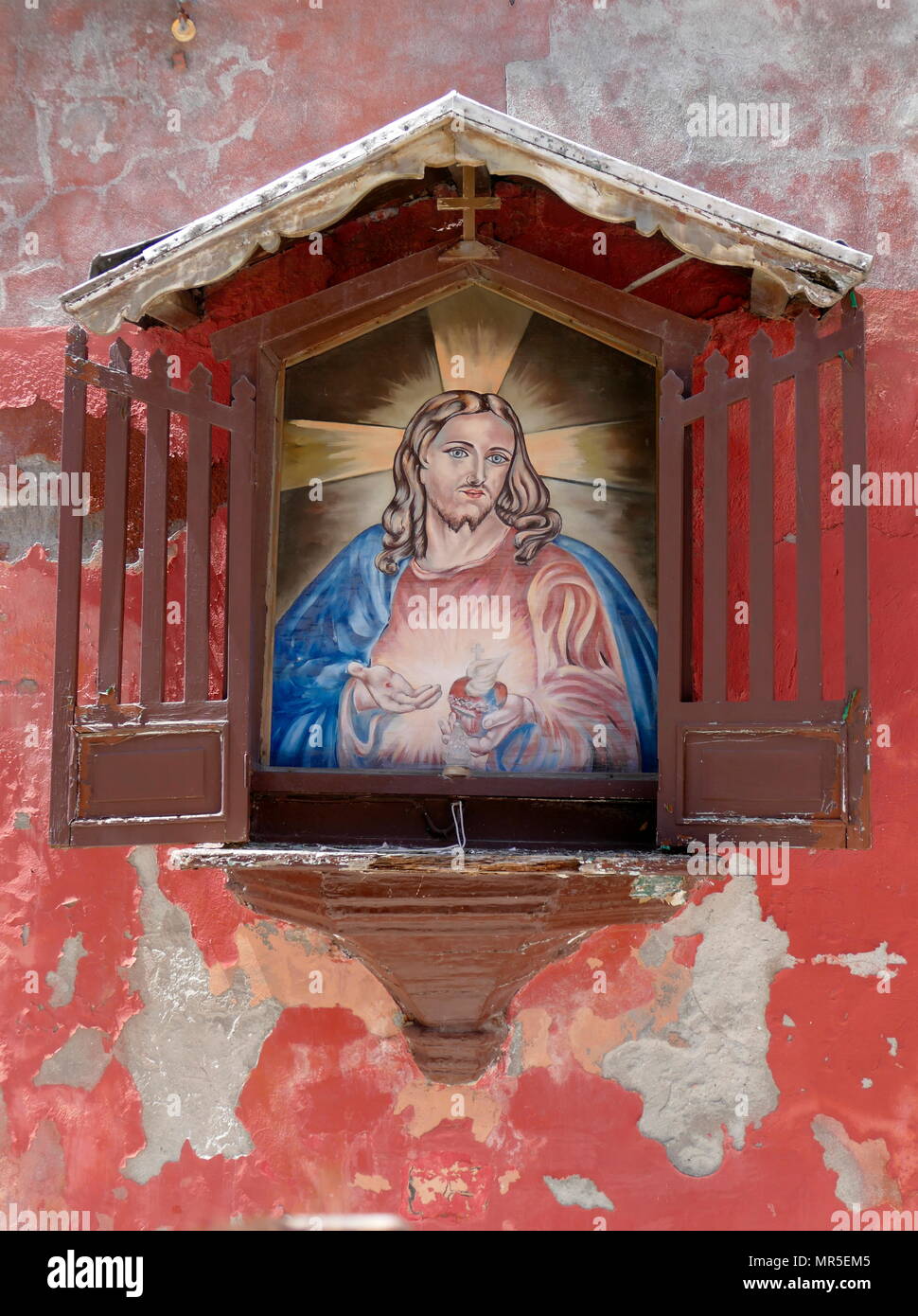 Santuario di strada che raffigura Gesù Cristo. Venezia, Quartiere Arsenale, Italia Foto Stock