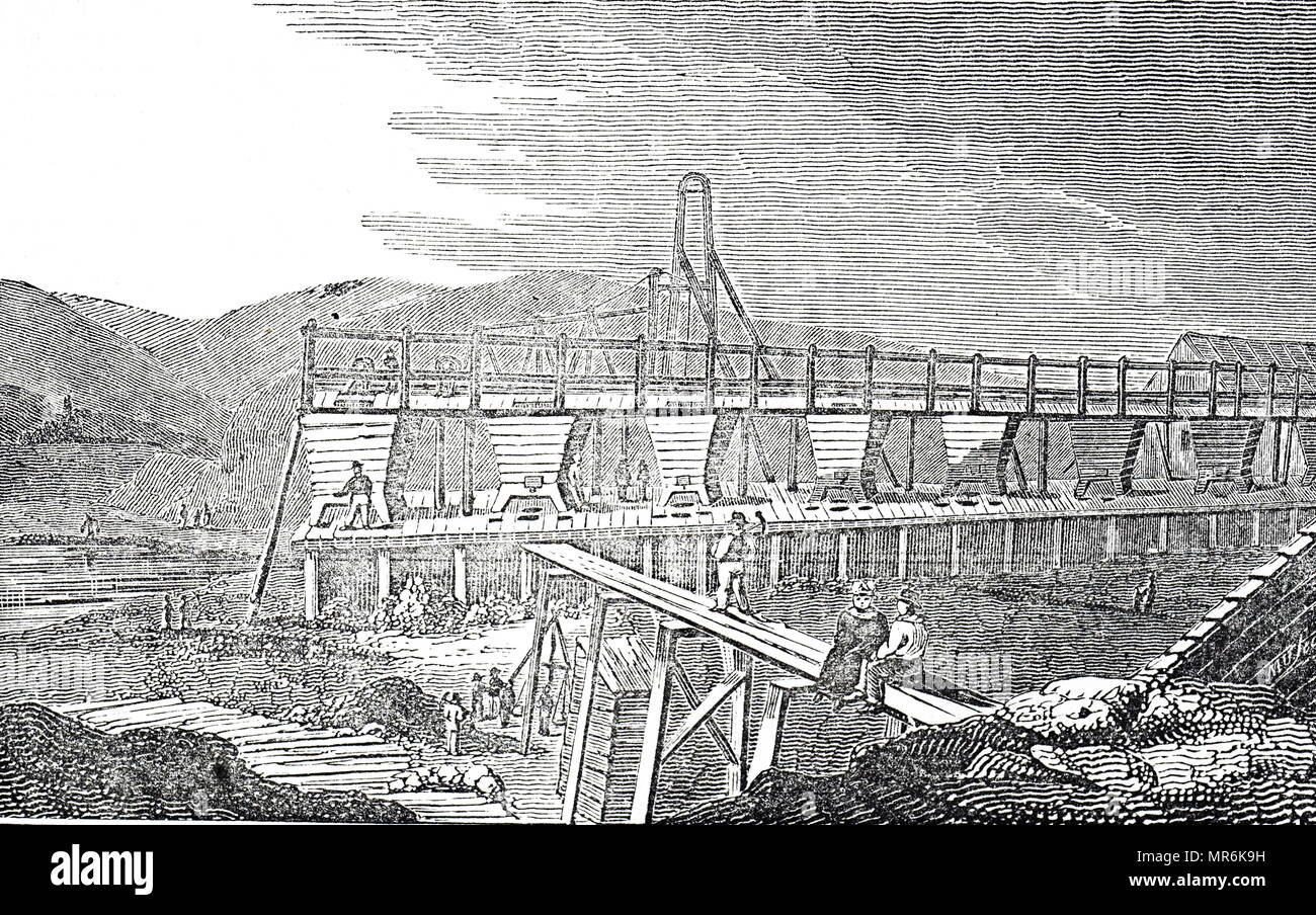 Incisione raffigurante Fowey Consols miniera di rame, Cornovaglia: una banca di jigging macchine sono state il primo processo verso l'estrazione di rame dal minerale è stato effettuato. Datata del XIX secolo Foto Stock
