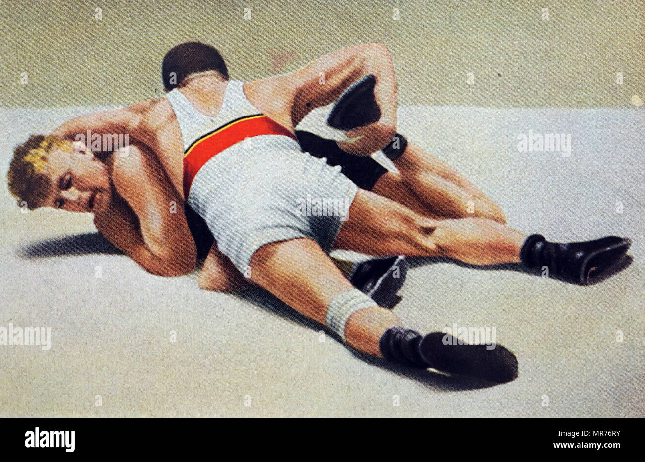 Fotografia di Jean Földeák & Dane Jensen wrestling al 1932 giochi olimpici. Questa partita è stata vinta da Jean Földeák. Successivamente ha vinto l'argento nei pesi medi evento. Foto Stock