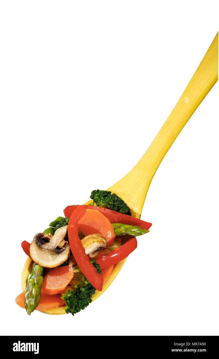 Il cucchiaio di legno con verdure Foto Stock