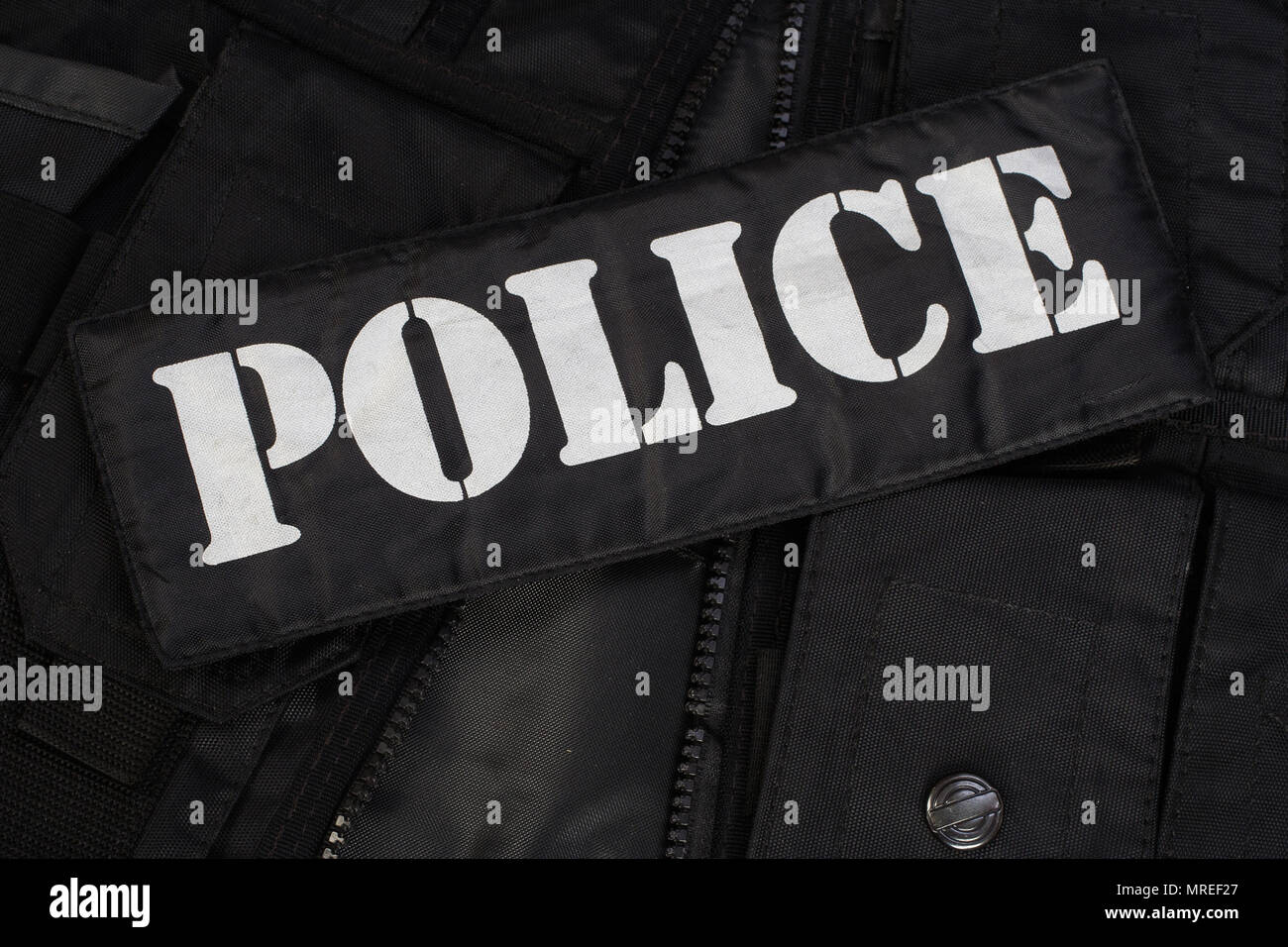 Armi speciali e operazioni tattiche team equipaggiamento su sfondo nero Foto Stock