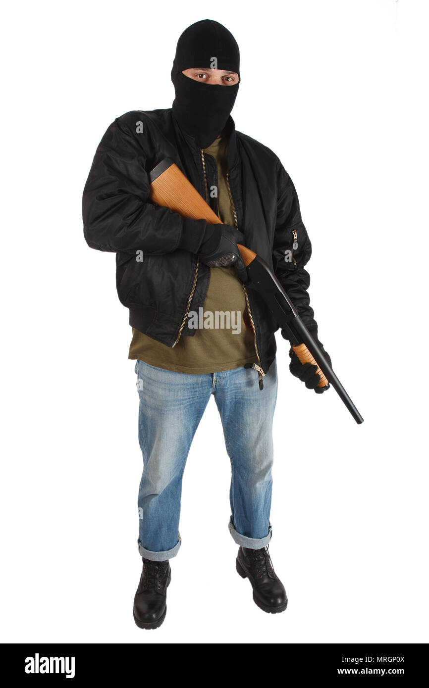 Mafioso in maschera nera con fucile isolato Foto stock - Alamy