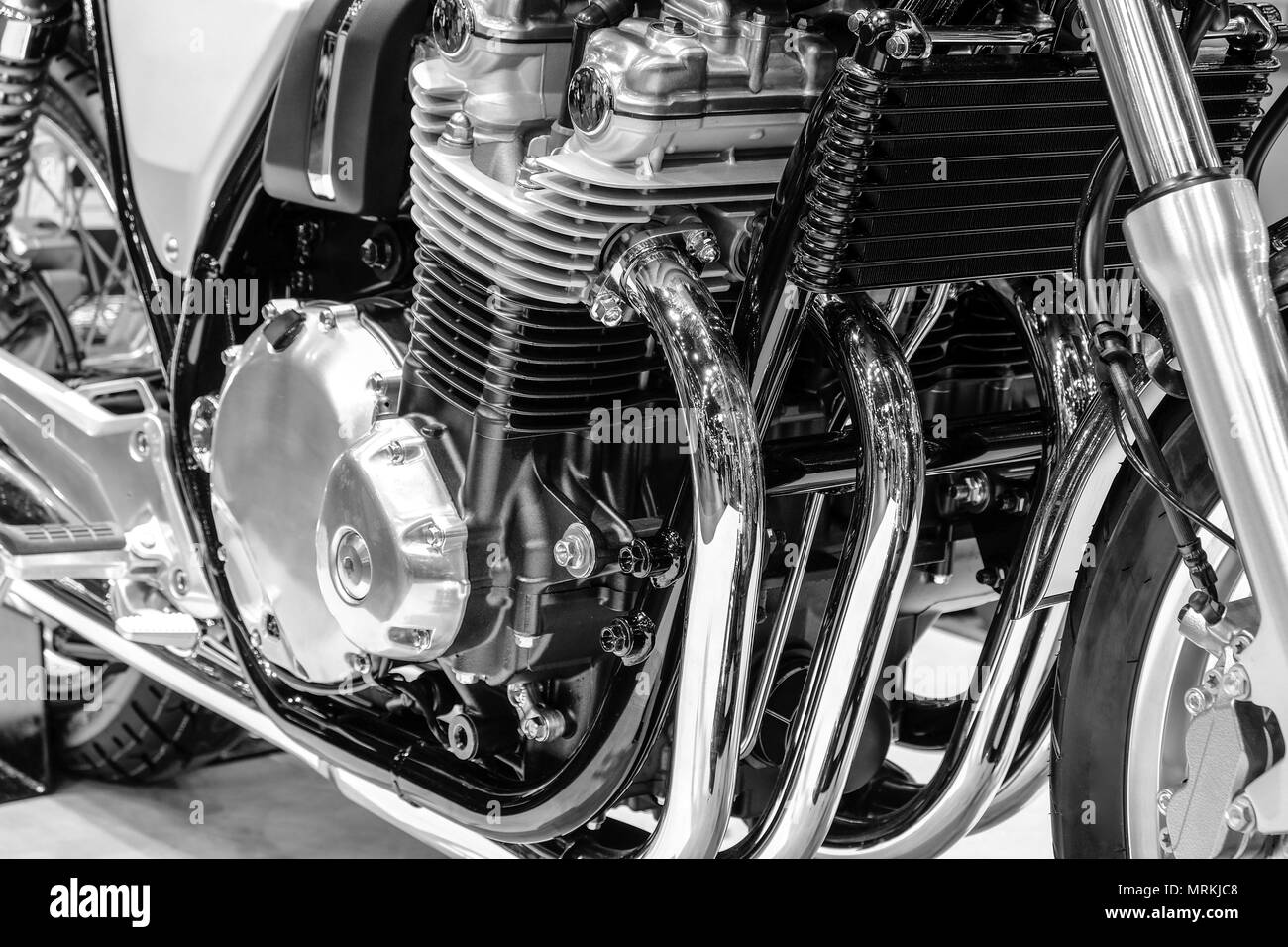 Close-up parte del motore del motociclo classico con il nero e il bianco del filtro Foto Stock