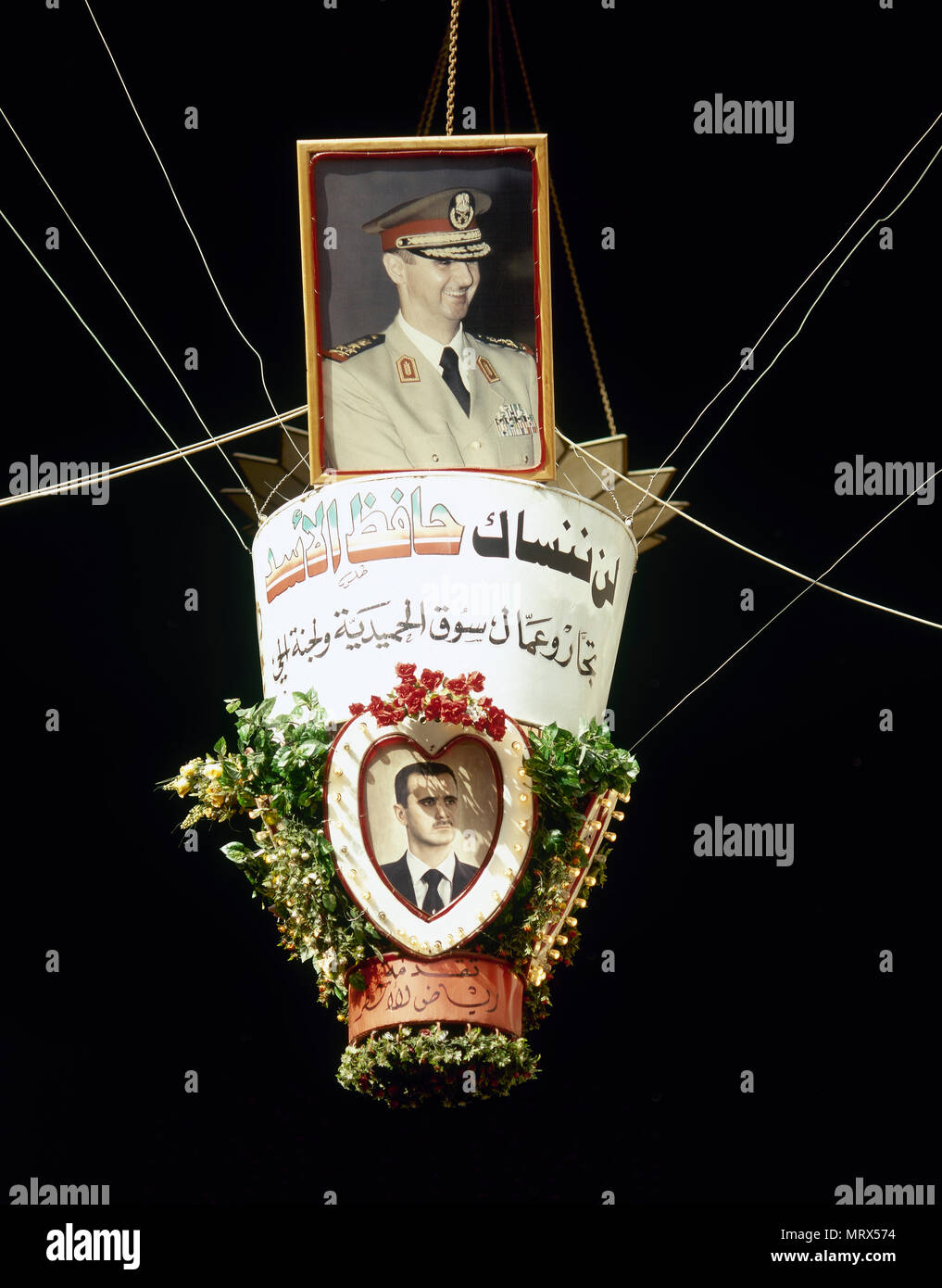 Bashar al-Assad (b. 1965). Presidente della Siria dal 2000 quando suo padre Hafez al-Assad (1930-2000) è morto. Foto propagandistica del regime siriano. La foto è stata scattata alcuni anni prima della guerra civile. Al-Hamidiyah Souq. Damasco. La Siria. Foto Stock