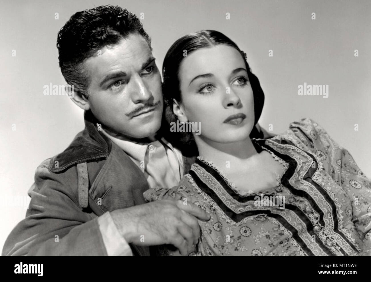 Alan Curtis e Patricia Morison in Hitler è pazzo (1943) Foto Stock