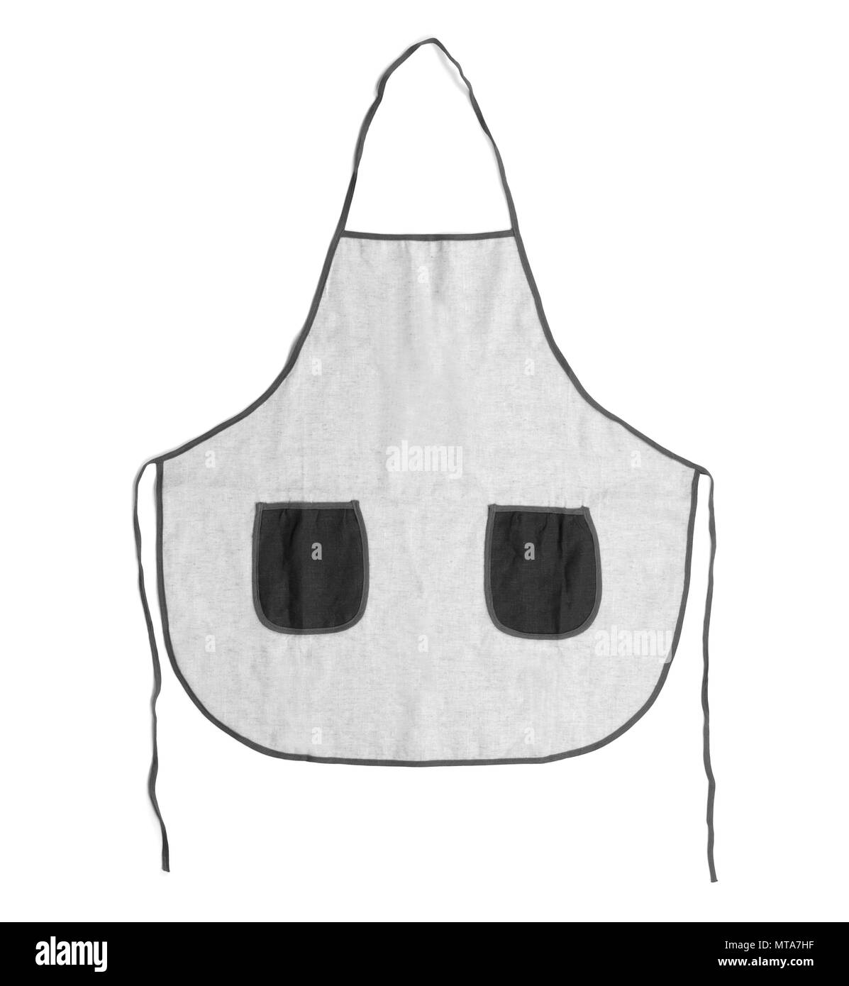 Grembiule bianco con tasche su sfondo bianco Foto Stock