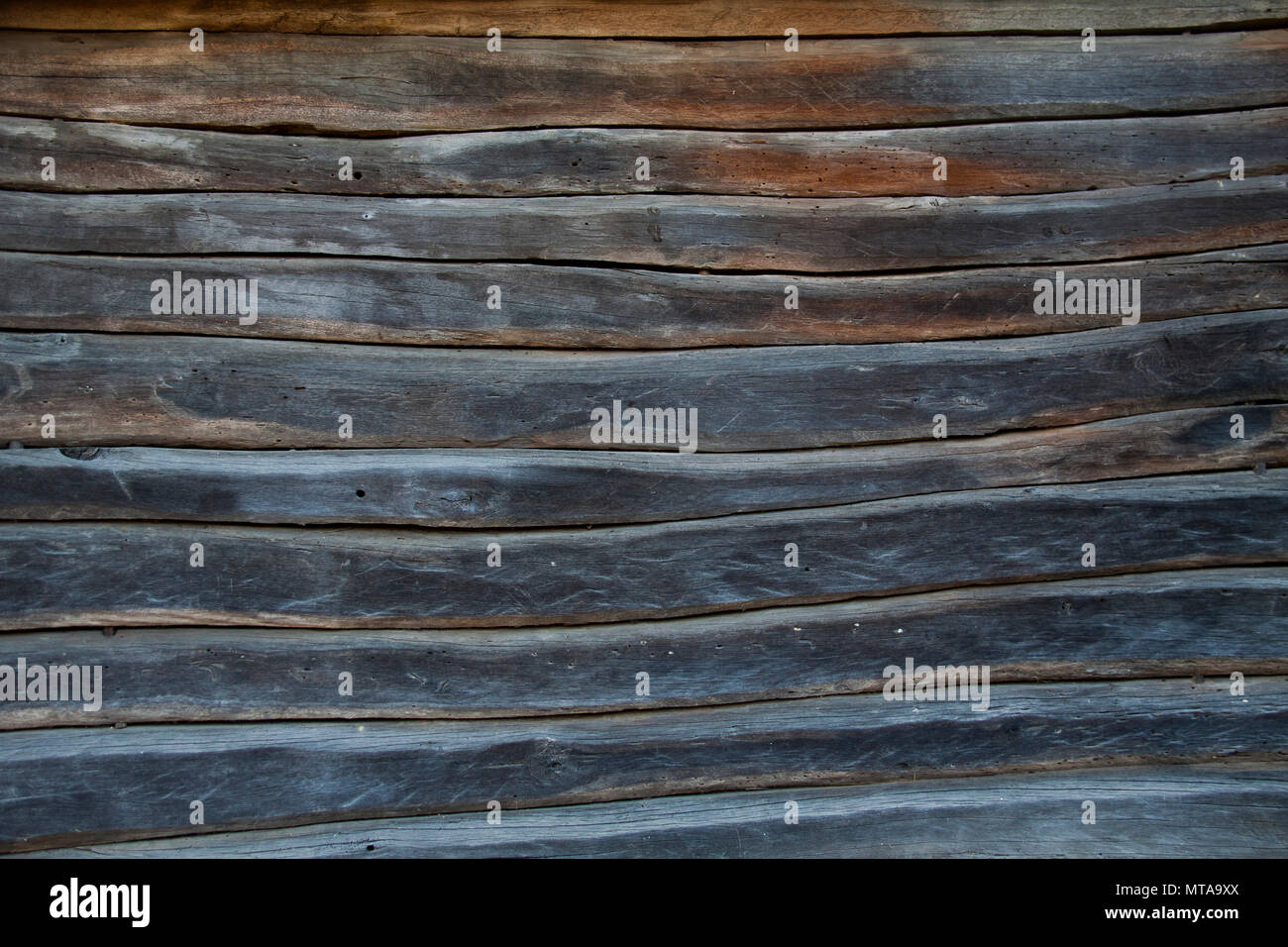 Sullo sfondo di un vecchio fienile in legno pannelli Foto Stock