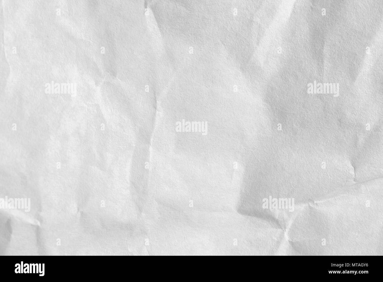 Crumpled white paper texture e lo sfondo Foto Stock