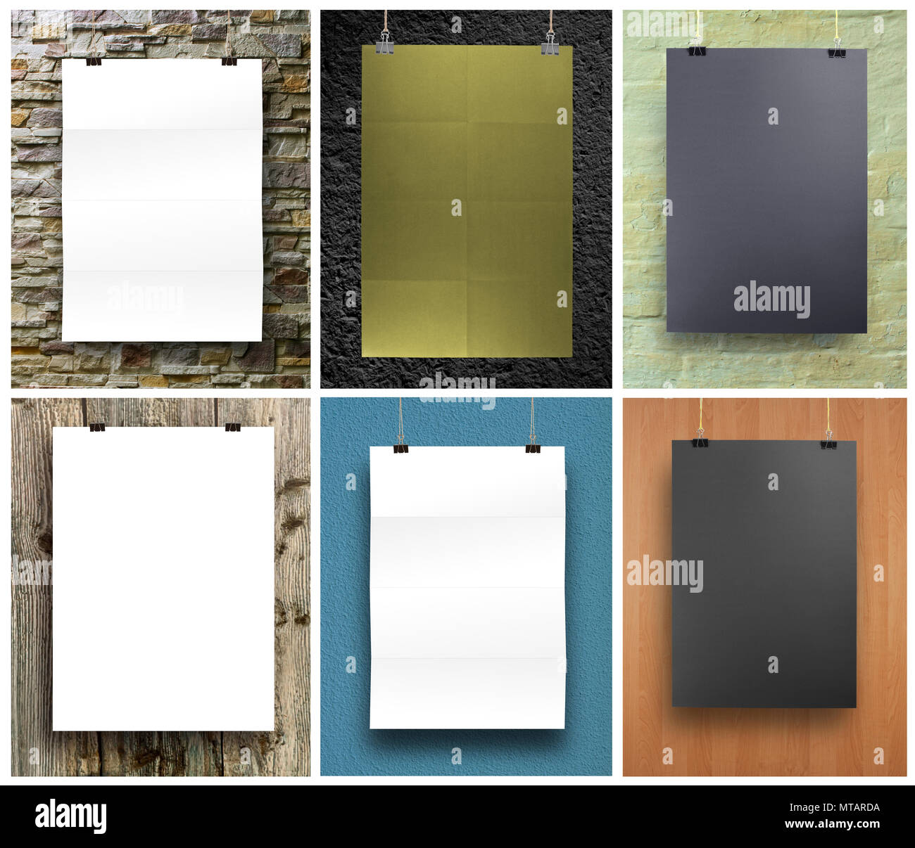 Set di bianco e nero poster su una fune. Foglio di carta si blocca sulle due graffe di legante Foto Stock
