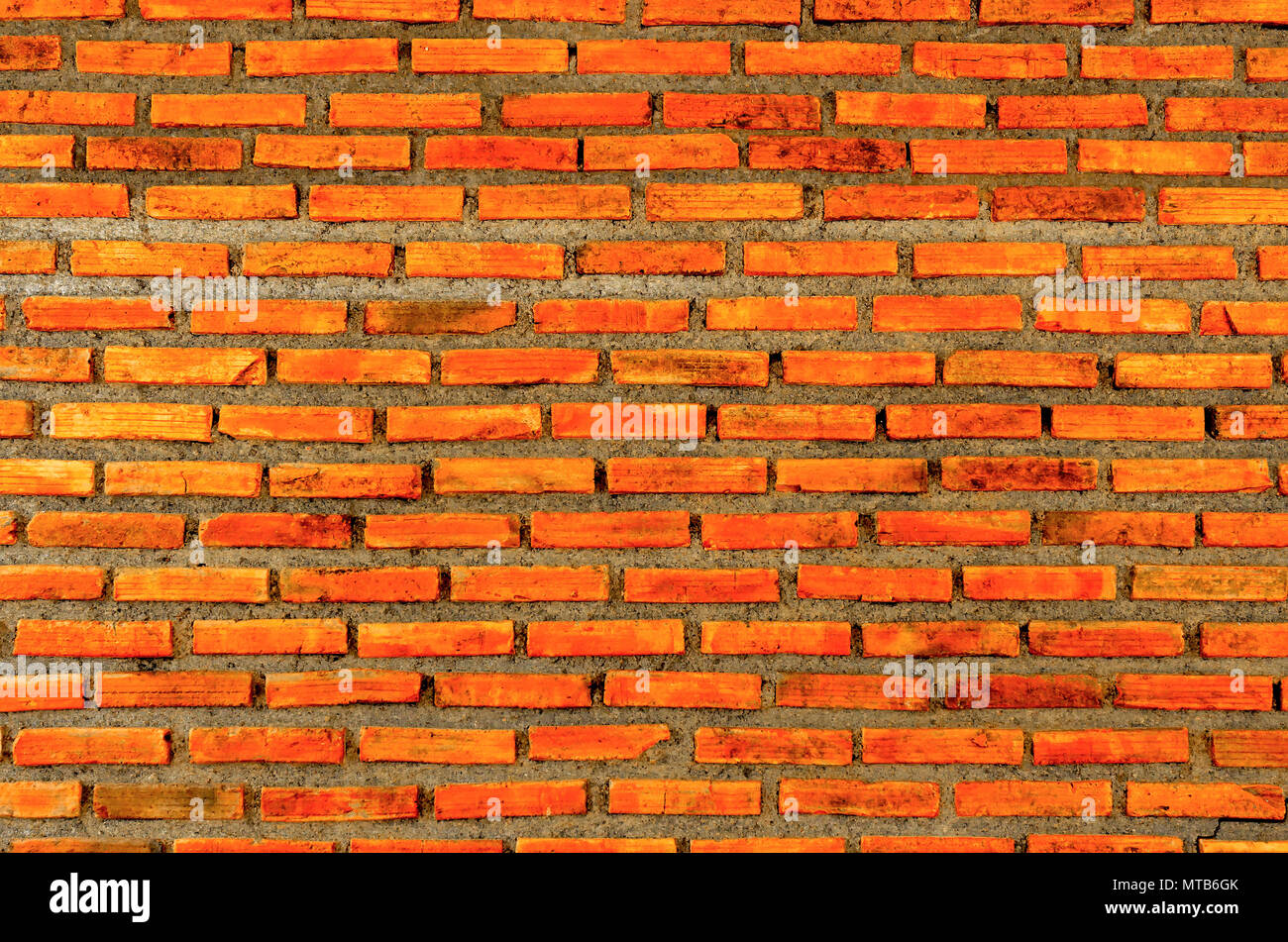 La parete di mattoni e Sfondo mattone di mattoni rossi e il modello di un muro di mattoni di sfondo, il vecchio muro di mattoni di consistenza e di annata del muro di mattoni Foto Stock
