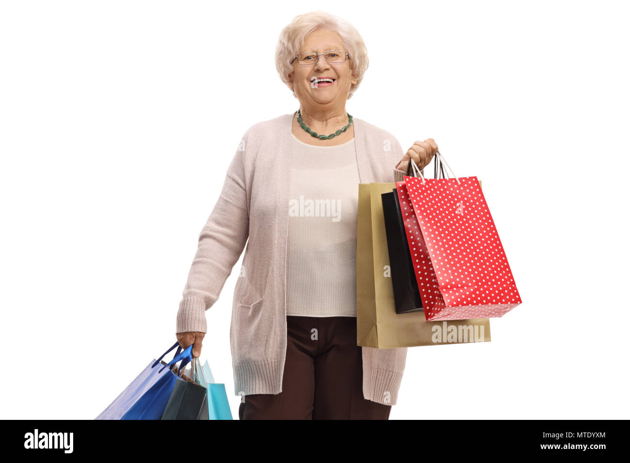 Donna matura con shopping bags isolati su sfondo bianco Foto Stock