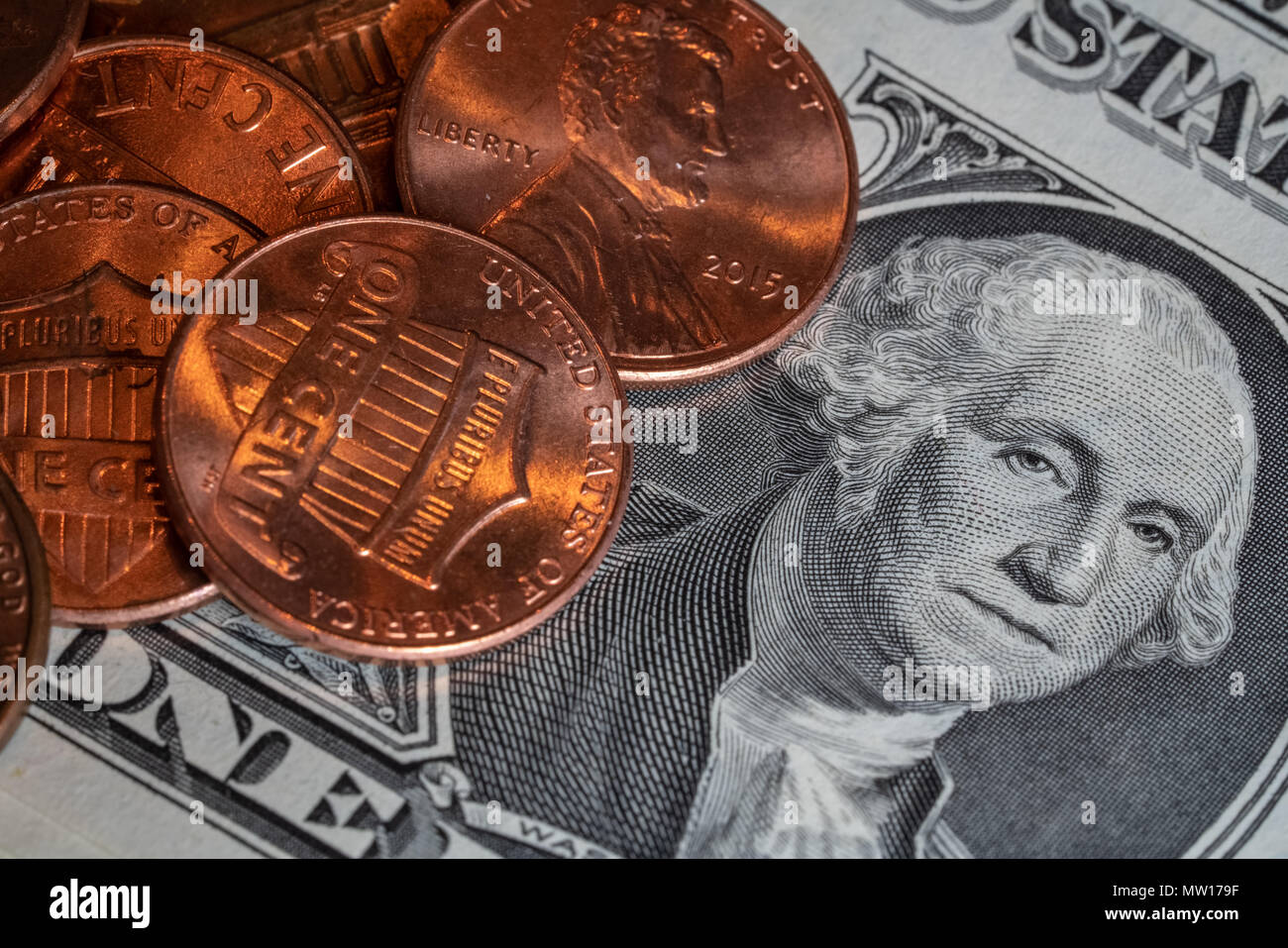 Shiny spiccioli e un dollaro Foto Stock