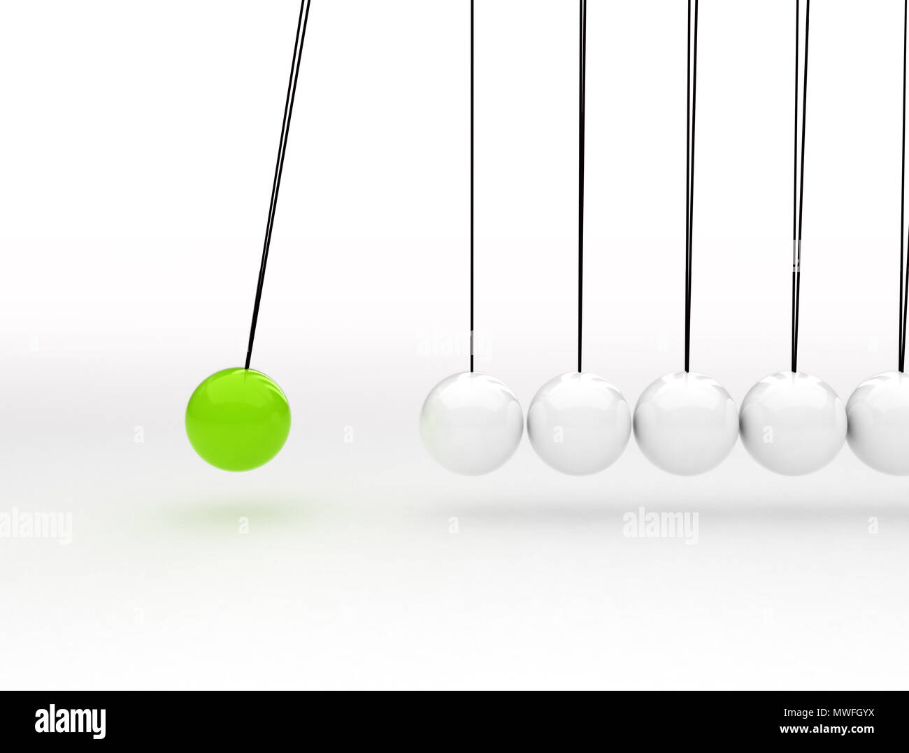 Newton cradle - palla verde in movimento Foto Stock