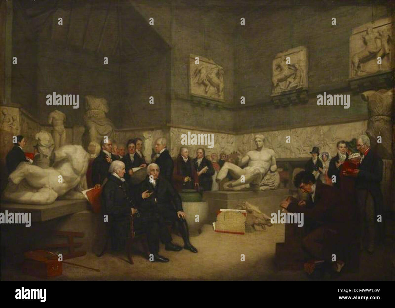 . Inglese: questo dipinto mostra una visione idealizzata del temporaneo Elgin camera presso il museo nel 1819, con ritratti di personale, un fiduciario e visitatori. La camera è stata progettata dal Museo dell'architetto Robert Smirke, per la visualizzazione temporanea delle sculture del Partenone portato da Atene da Lord Elgin conosciuta come 'marmi di Elgin', acquistato dal governo e depositato nel Museo Britannico nel 1816. . 1819. Archibald Archer 590 Elgin temporanea camera presso il museo nel 1819 Foto Stock