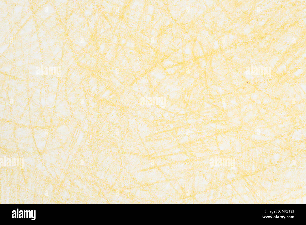 Colore giallo matita scarabocchia su carta texture di sfondo Foto Stock