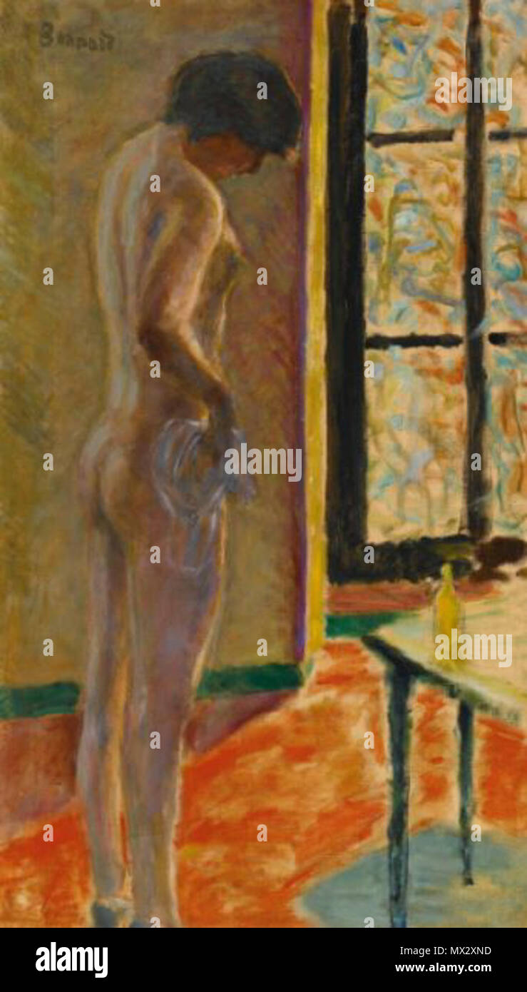 450 NU À LA FENÊTRE Foto Stock