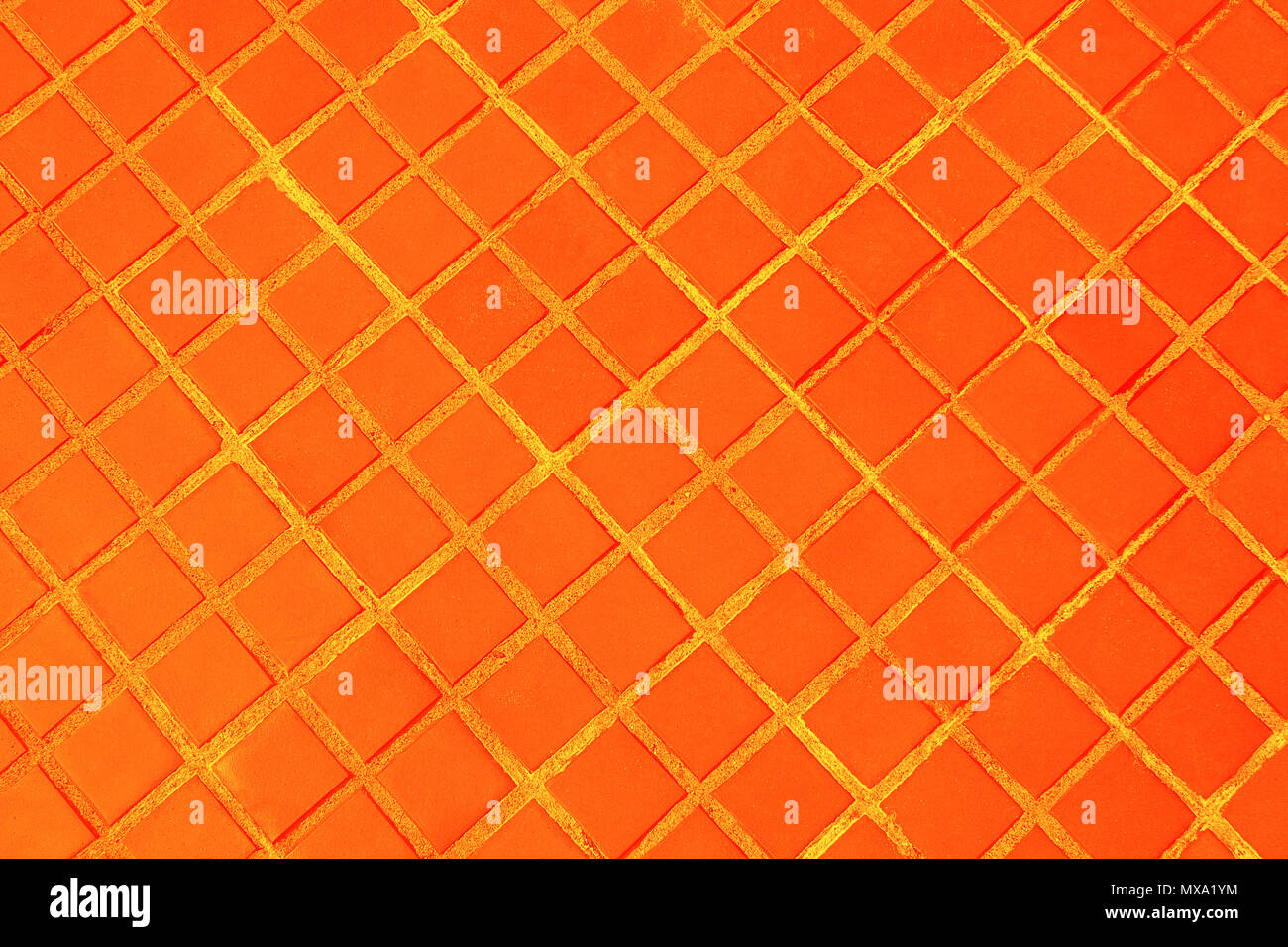 Pietra di sfondo sul marciapiede o texture le due tonalità di colore arancione Foto Stock