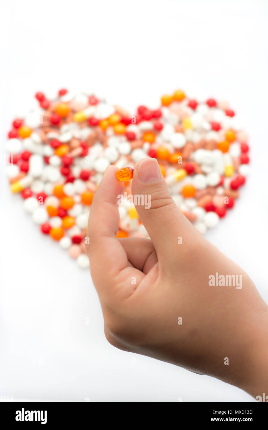 Le capsule di medicina e il concetto di salute Foto Stock