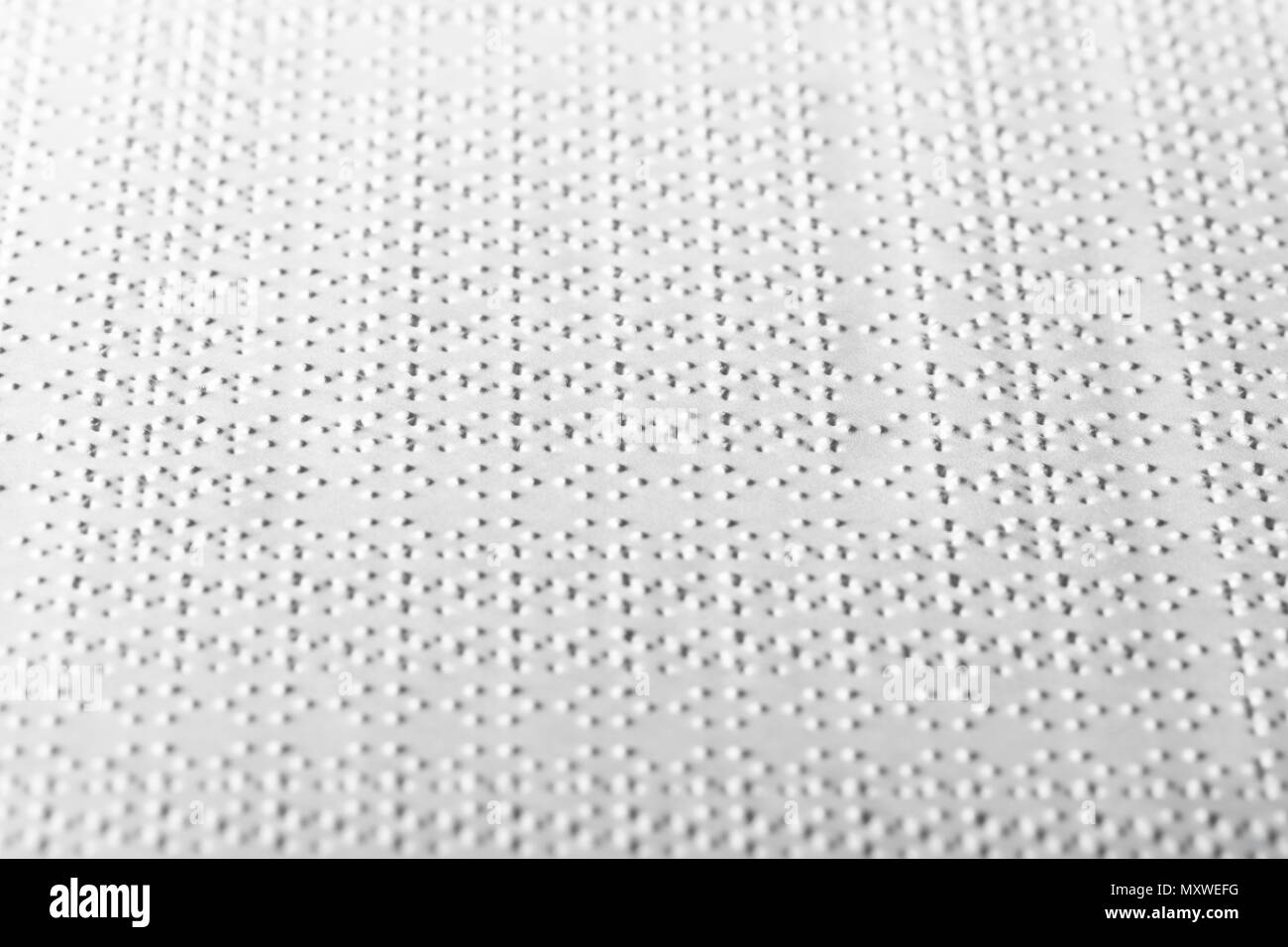Un libro di formazione con testo Braille. Modello tattile. Foto Stock