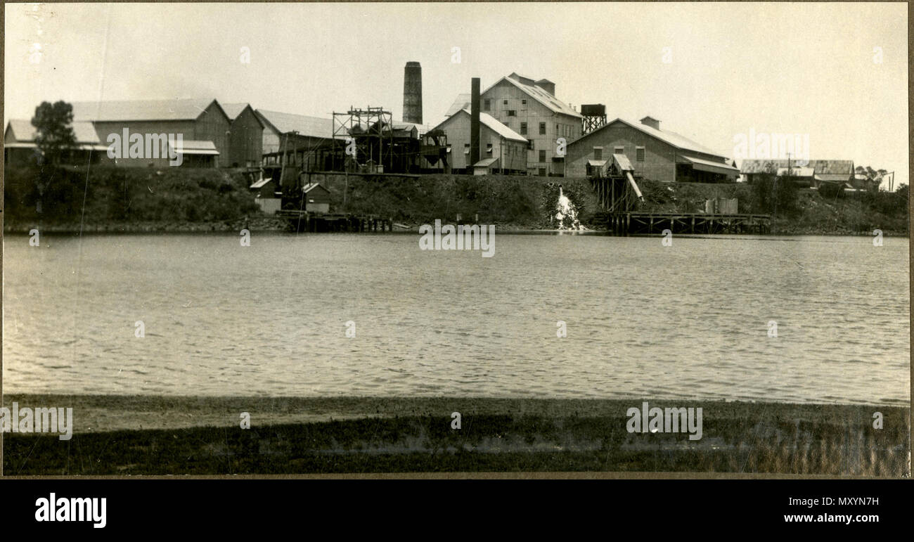 Millaquin raffineria di zucchero ed il mulino di frantumazione, fiume Burnett, Bundaberg, c. Mulino Millaquin inaugurato nel 1882 ed è tuttora funzionante. Foto Stock