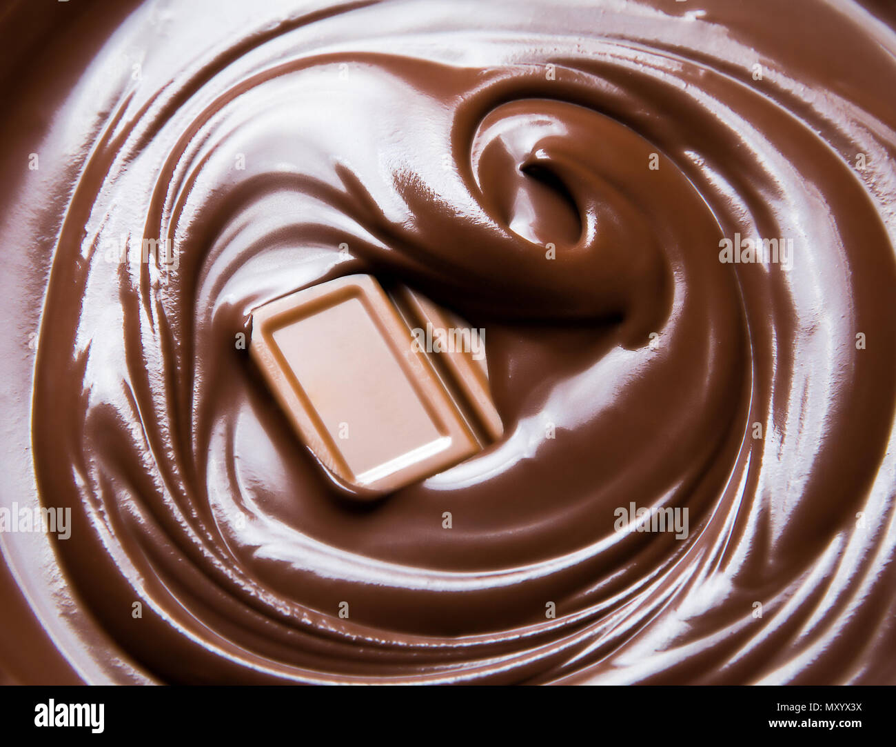 Fondere il cioccolato swirl e barra di cioccolato Foto Stock
