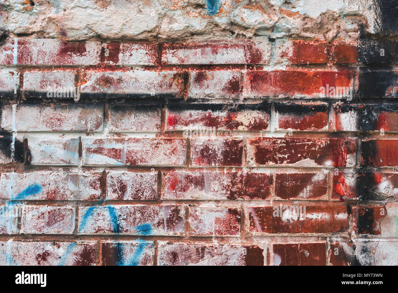Grunge muro di mattoni dettaglio per temi urbani sfondo Foto Stock
