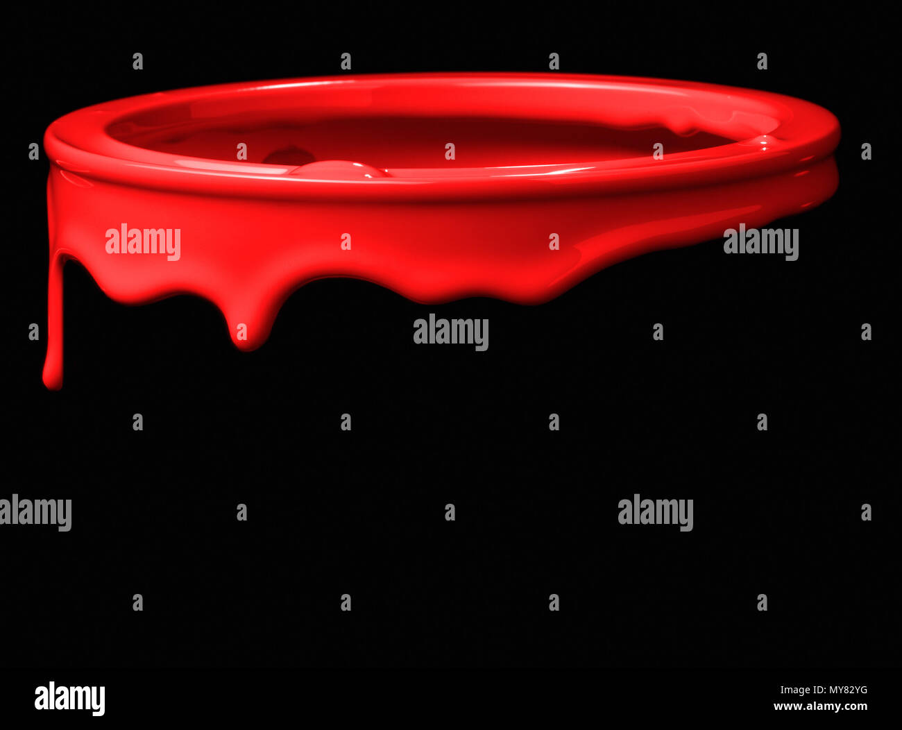 Vernice colorata perde giù sopra la parte di metallo della benna. Isolato su sfondo nero Foto Stock