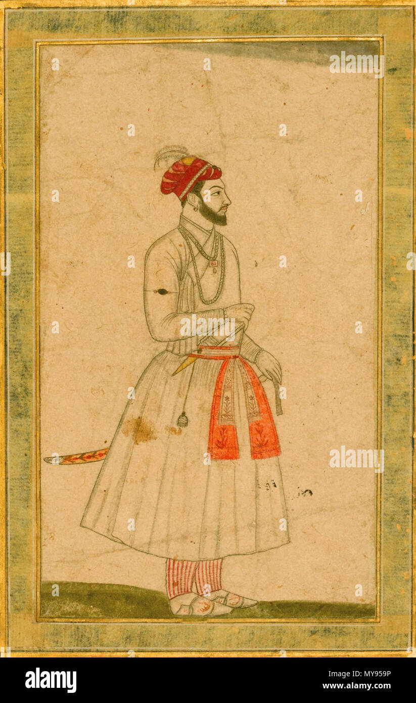 . Inglese: Un ritratto del principe Kam Baksh, figlio di Aurangzeb, India, Mughal, XVIII secolo stima: 500 - 800 GBP PARTITA VENDUTA. 2.750 GBP (Martello prezzo con acquirente Premium) Inchiostro con uso di colori su carta montata su pagina album con oro-blu chiazzata frontiere, inscritto nel bordo inferiore e sulla retromarcia in inchiostro nero in nasta"script liq 'shabihi Shahzadeh Kam Bakhsh' disegno: 18.6 da 10.4cm Foglia: 44,3 da 28.6cm. Il XVIII secolo. India, Mughal, 18 un ritratto del principe Kam Baksh, figlio di Aurangzeb Foto Stock