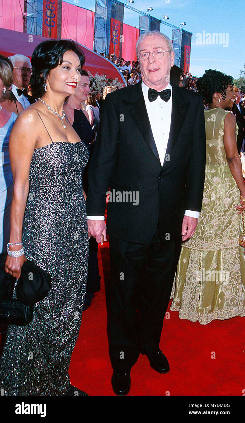 26 Mar 2000, Los Angeles, California, Stati Uniti d'America --- Michael Caine con la moglie Shakira --- Image by © . / USAMichael Caine con la moglie Shakira 2 Red Carpet Event, verticale, STATI UNITI D'AMERICA, industria cinematografica, celebrità, fotografia, Bestof, arte cultura e intrattenimento, Topix celebrità moda / Verticale, meglio di, evento nella vita di Hollywood - California, moquette rossa e dietro le quinte, USA, industria cinematografica, celebrità, movie celebrità, personaggi televisivi, musica celebrità, fotografia, Bestof, arte cultura e intrattenimento, Topix, verticale, inchiesta tsuni@Gamma-USA.com, celebrità con i membri della famiglia ( marito e moglie di un Foto Stock