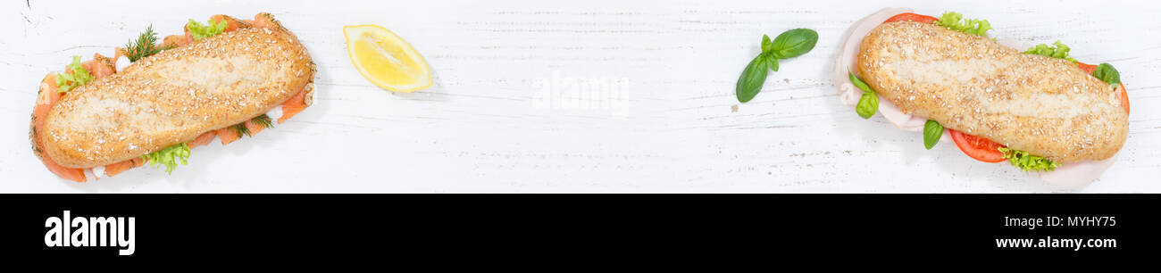 Sub sandwich grano intero prosciutto crudo di pesce Salmone copyspace banner spazio copia da sopra Foto Stock