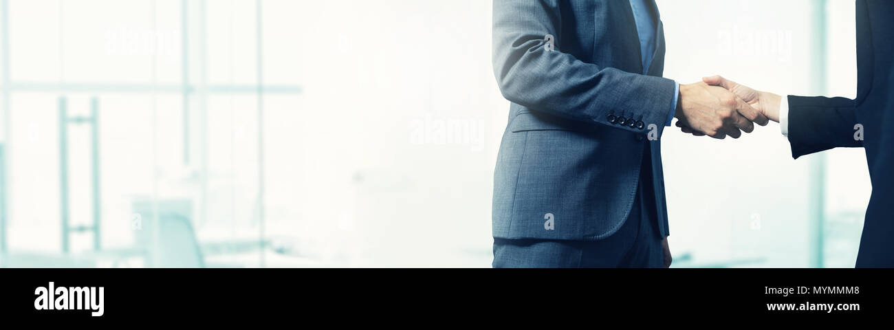 Background aziendale - imprenditori handshake con spazio di copia Foto Stock