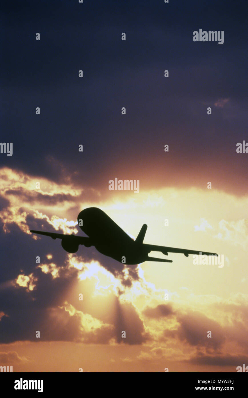 1992 Silhouette storico di volo aereo commerciale Foto Stock