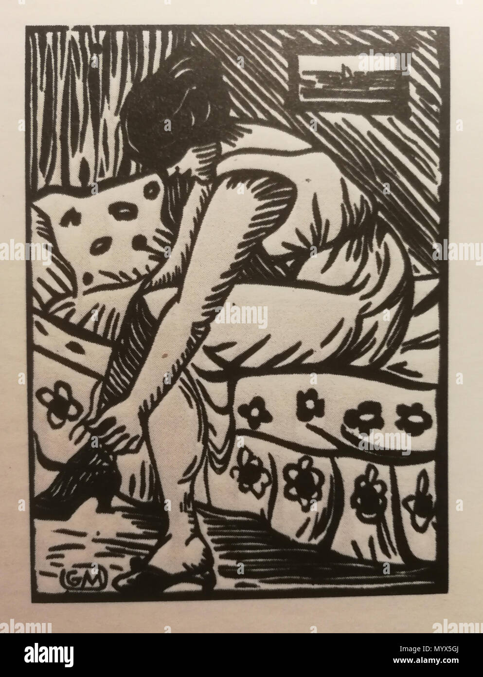 . Inglese: Femme tirant ses bas, incisione su legno, da Galerie Barbery (Parigi) . 1920s. Gaspard Maillol (1880-1946) 39 Gaspard-Maillol Femme tirant ses bas Foto Stock