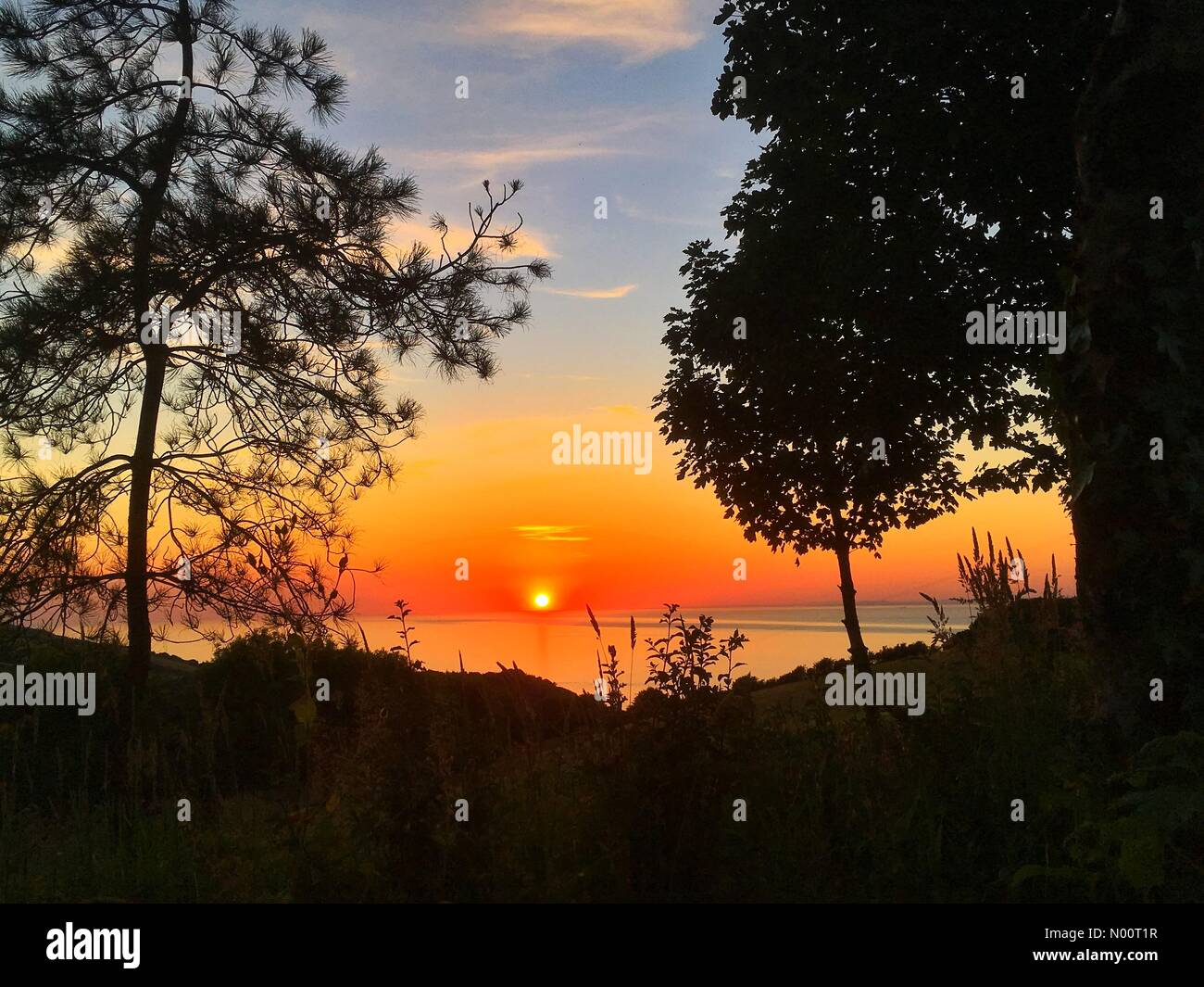 Bel tramonto a Lynton North Devon UK meteo Foto Stock