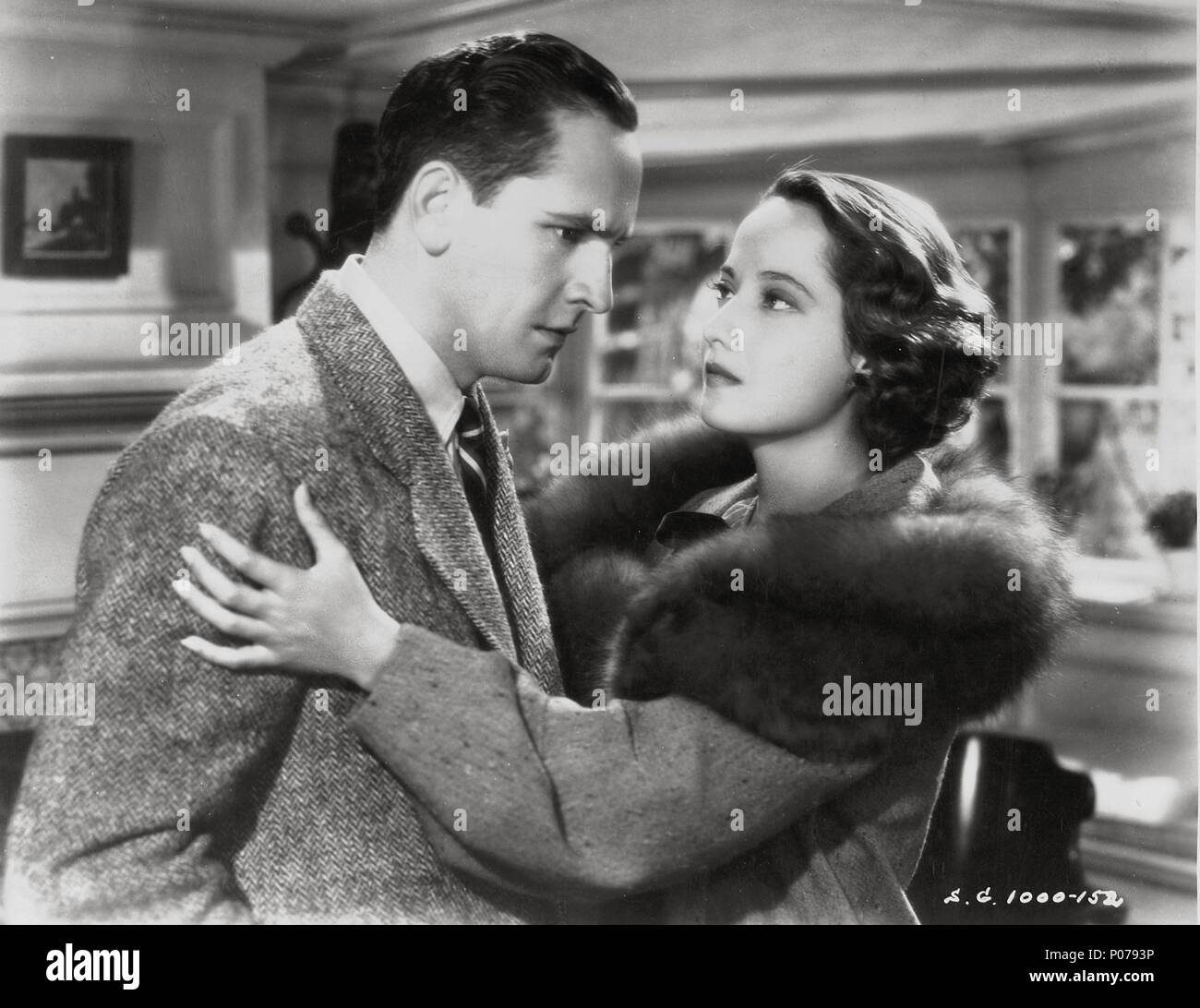 Pellicola originale titolo: Dark Angel. Titolo inglese: il Dark Angel. Regista: SIDNEY FRANKLIN. Anno: 1935. Stelle: FREDRIC MARZO; MERLE OBERON. Credito: United Artists / Album Foto Stock