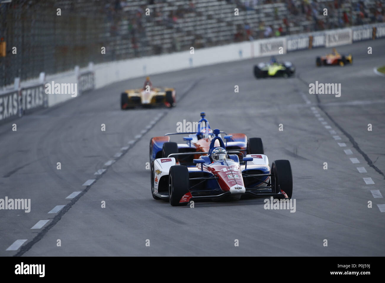 Fort Worth, Texas, Stati Uniti d'America. Il 9 giugno, 2018. TONY KANAAN (14) del Brasile battaglie per posizione durante la tecnologia DXC 600 al Texas Motor Speedway di Fort Worth, Texas. Credito: Justin R. Noe Asp Inc/ASP/ZUMA filo/Alamy Live News Foto Stock