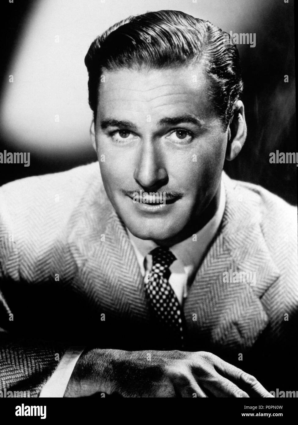 Anno: 1940. Stelle: Errol Flynn. Foto Stock
