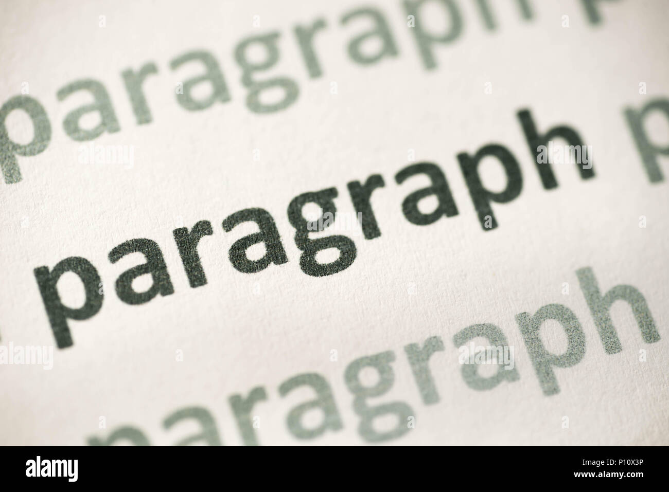 Parola punto stampato su carta bianca macro Foto Stock