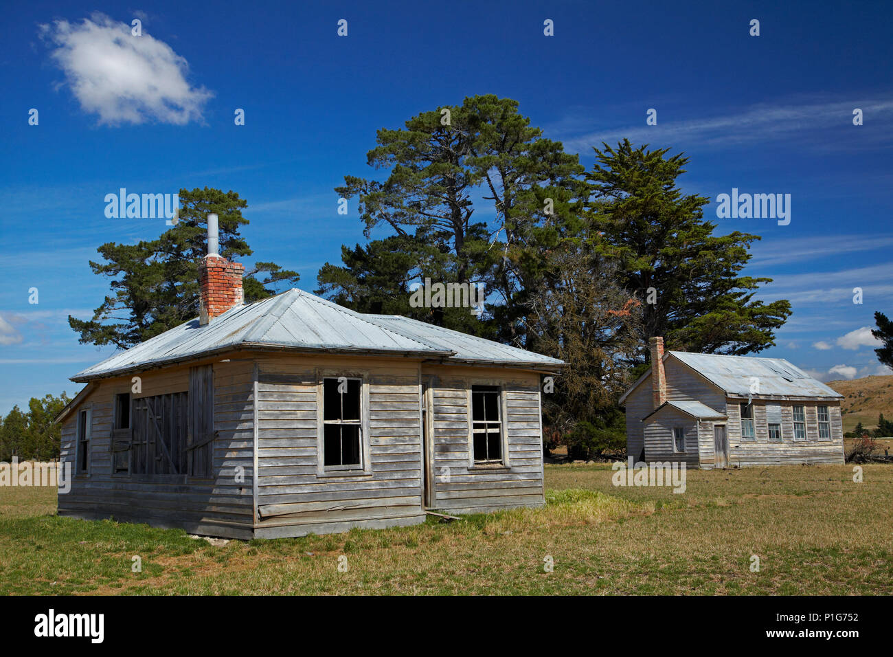 Vecchia Scuola di luna la casa e la scuola, Moonlight, vicino Macraes piana, East Otago, Isola del Sud, Nuova Zelanda Foto Stock