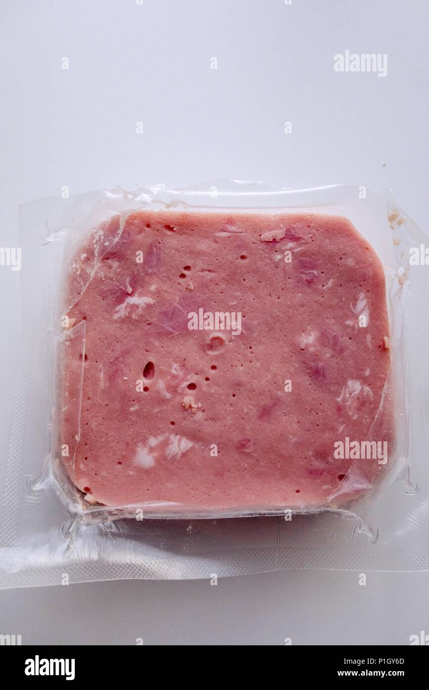 Aprire il pacchetto del prosciutto cotto fette Foto Stock