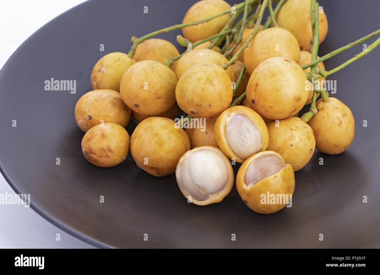 Uva birmano - Mafai in Thai, dolce e aspro della frutta (nome scientifico è Baccaurea ramiflora Lour) Foto Stock