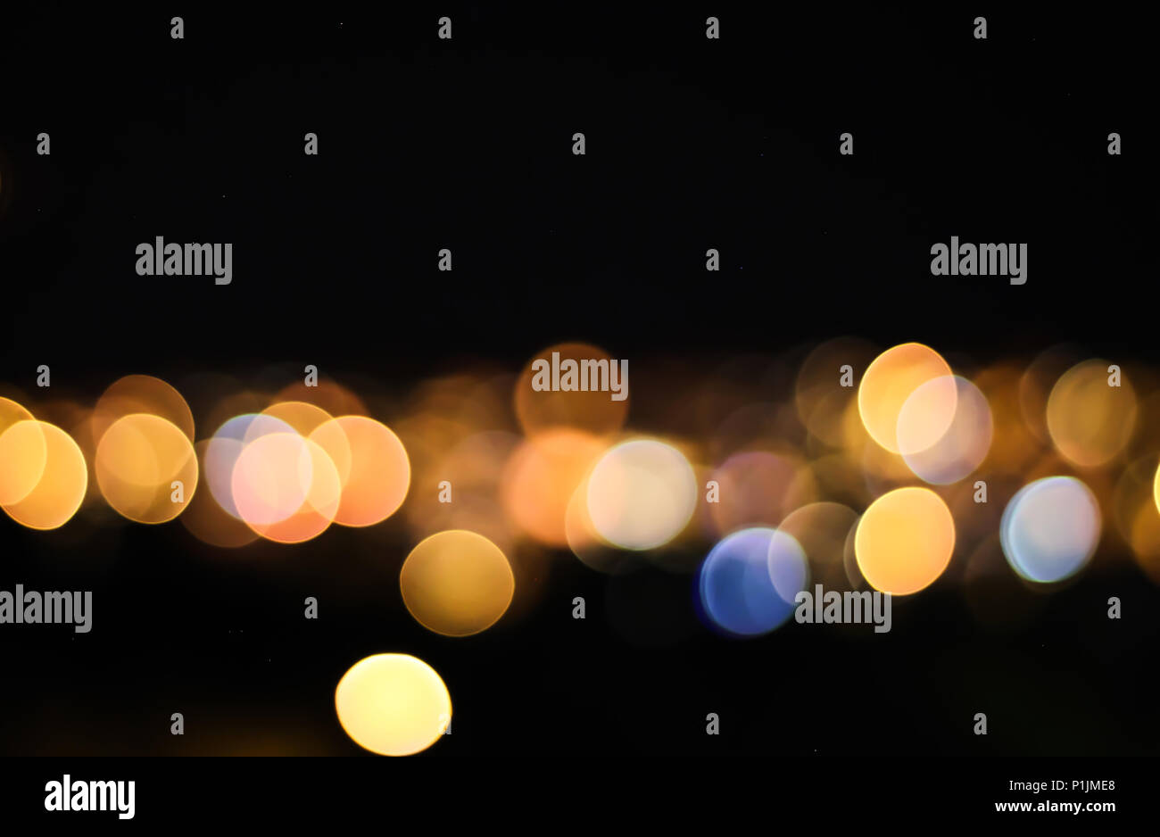Magnifica bokeh cerchi da notte scape panorama cittadino Foto Stock