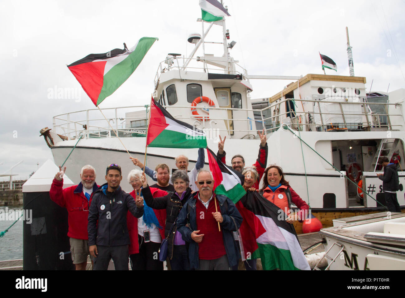 Spagna. 12 Giugno, 2018. Le barche Al Awda (il ritorno) e Libertà (Libertà) della libertà flottiglia arrivano al porto di Gijón. La navigazione ha iniziato a metà maggio in porti scandinavi essendo il suo precedente arresto La Rochelle (Francia). La campagna un futuro dignitoso per la Palestina sfide illegale e disumano blocco della striscia Credito: Mercedes Menendez/Pacific Press/Alamy Live News Foto Stock