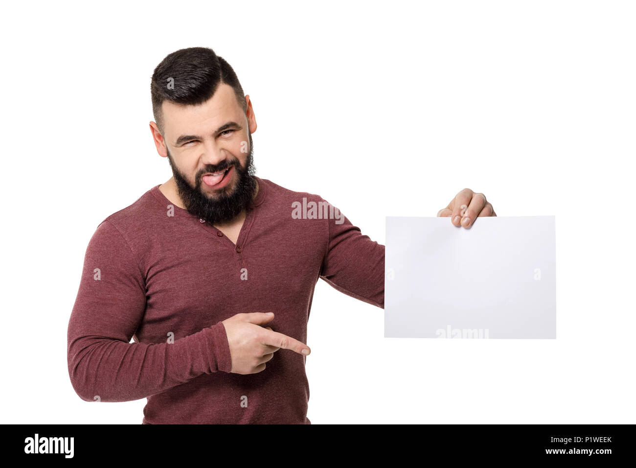 Uomo Barbuto azienda carta bianca. Foto Stock