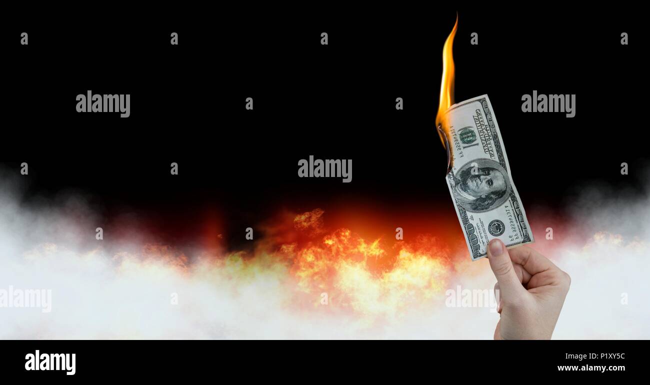 Dollar denaro nota la masterizzazione su fire Foto Stock